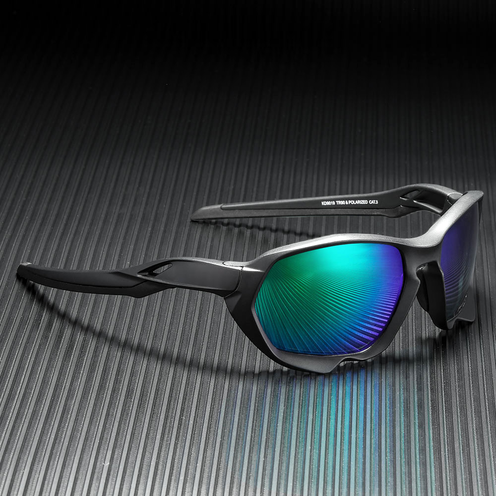 cycling sunglasses with black frames and green lenses